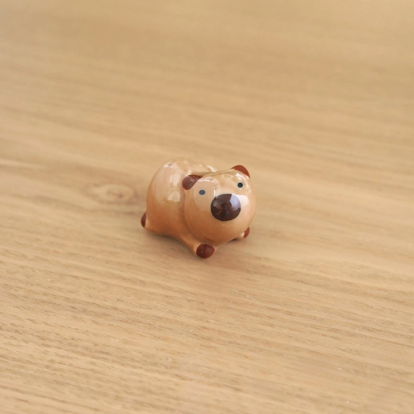 🦫 Capybara-Shaped Ceramic Utensil & Chopstick Rest
Bring a calm, cozy capybara vibe to your dining table or desk! 