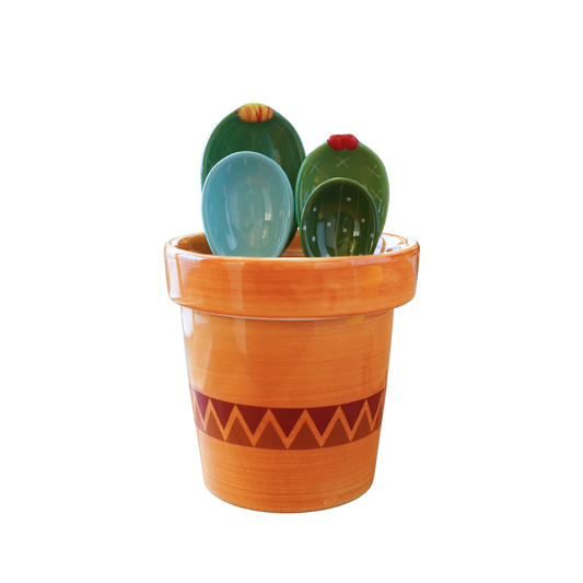 Green and blue cactus measuring spoons with striped terracotta ceramic cup